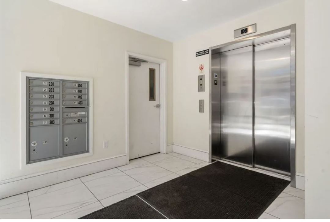 mailroom area with elevator access