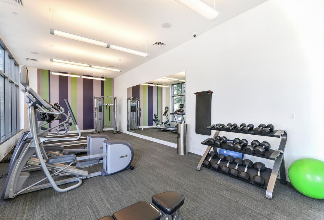 fitness center with an assortment of equipment
