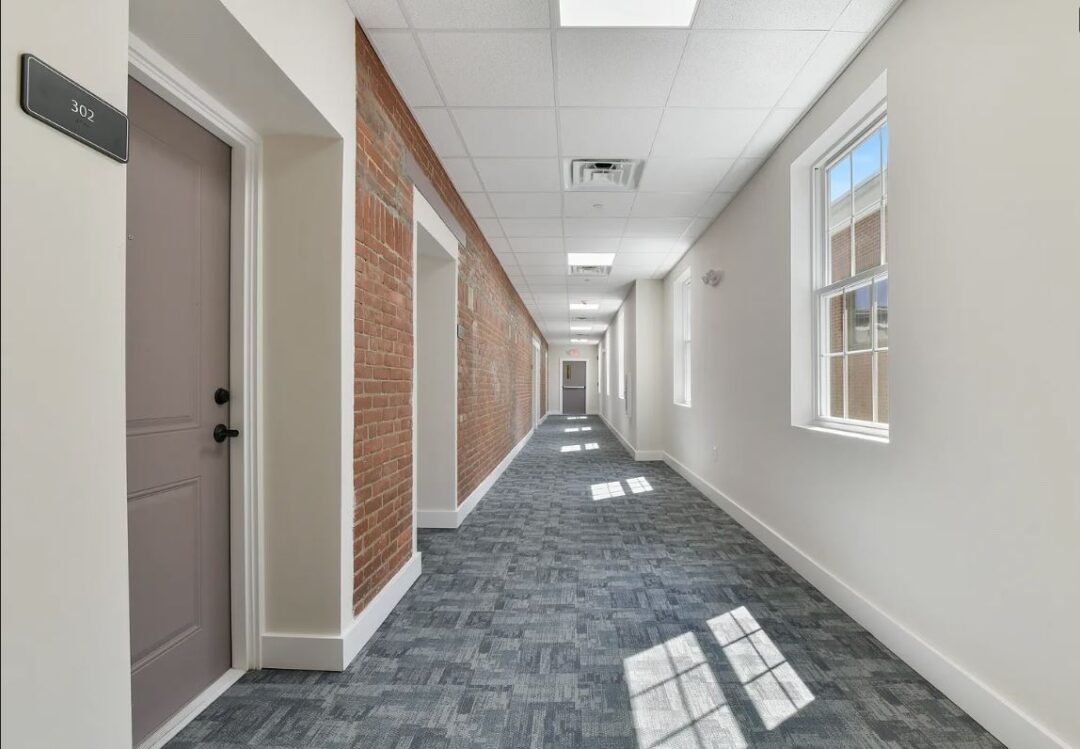 apartment style hallway with carpeting