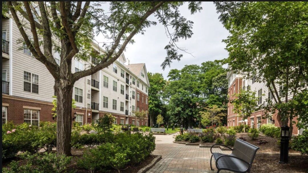 The Avens at Newton Highland exterior apartment style building
