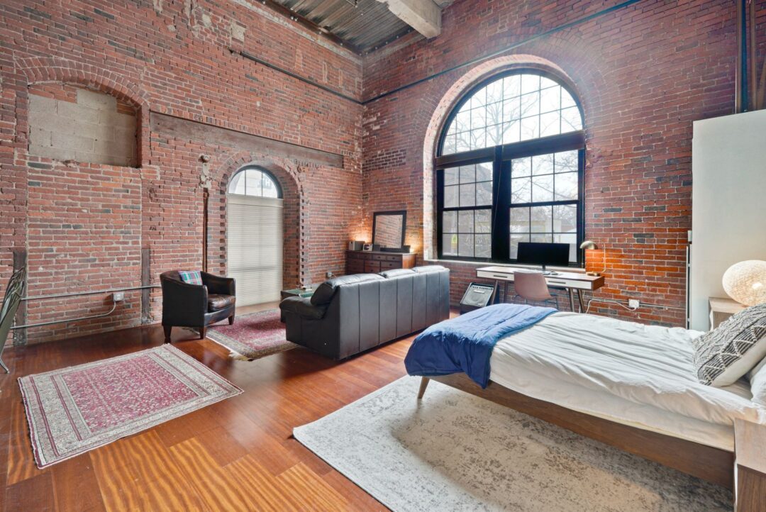 loft style with bedroom, living room and kitchen area