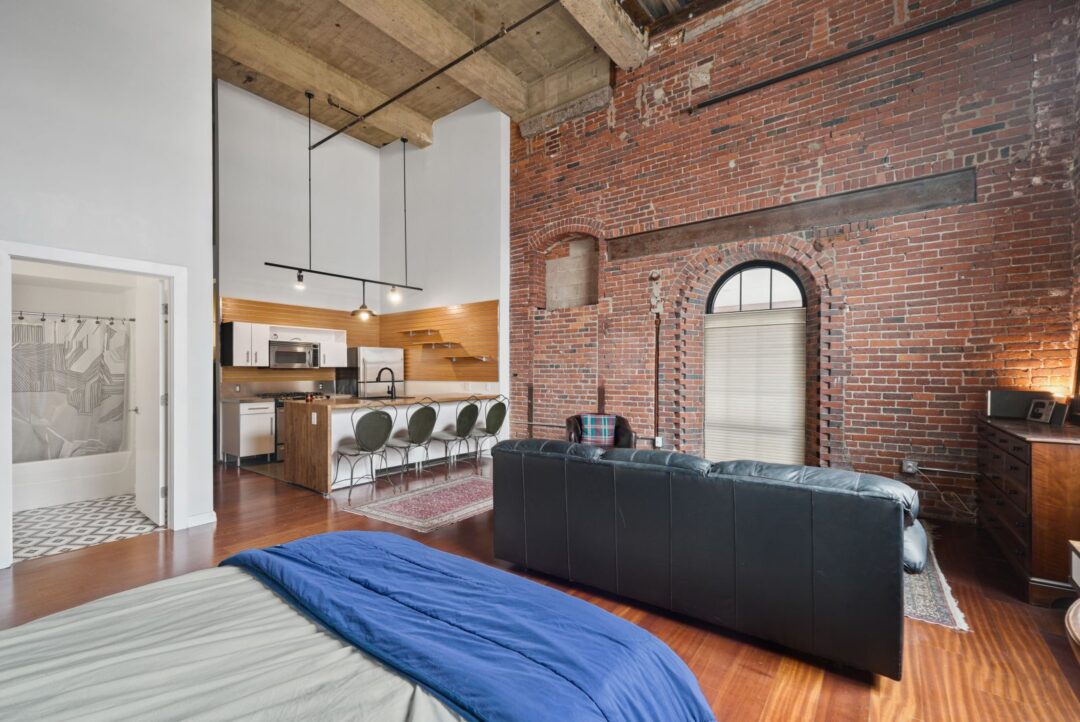 loft style with bedroom, living room and kitchen area