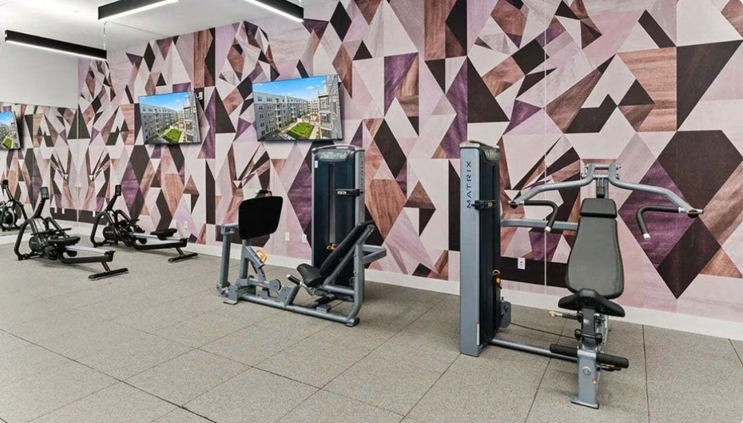 fitness center with an assortment of exercise equipment
