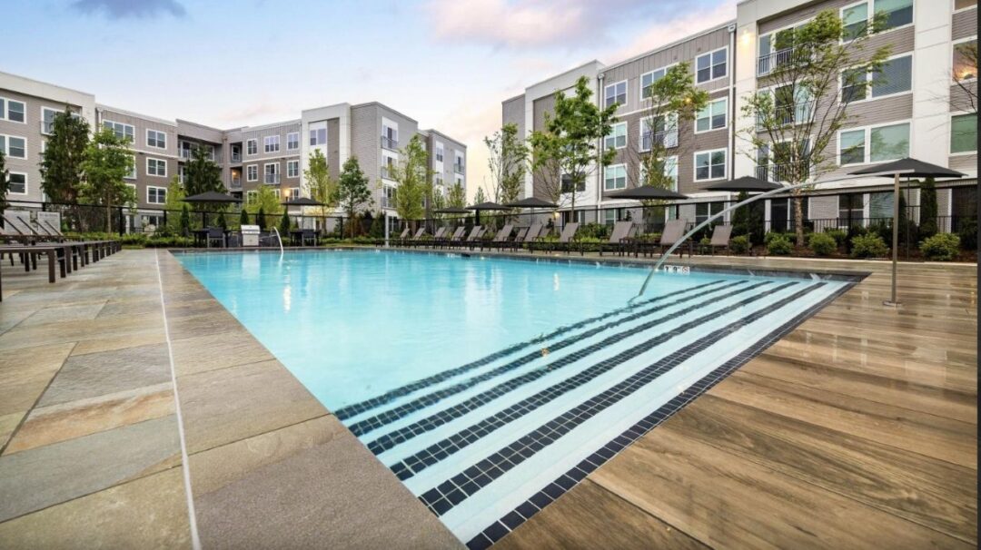 Olympic style pool with chairs surrounding