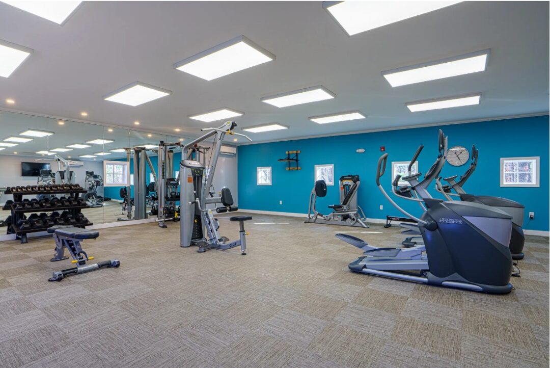 fitness center with an array of workout equipment.